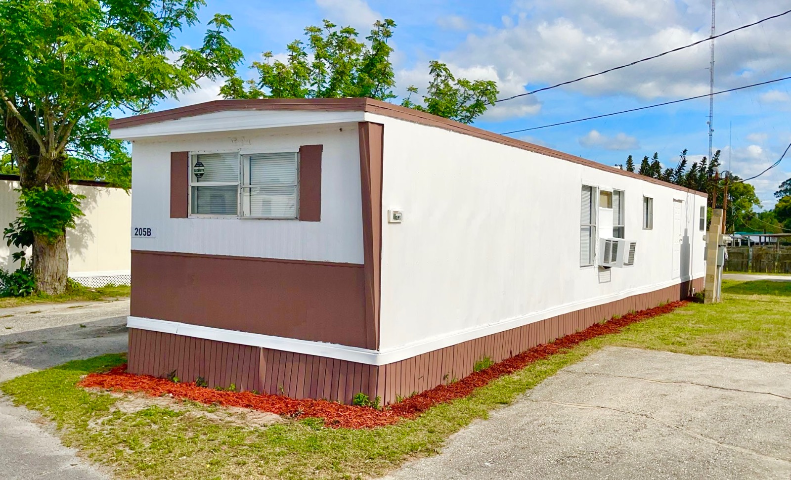 This Recently Updated 2 bedroom, 1 bath mobile home is Located In Cocoa Estates , an all-age community that offer a lot rent of only $575 a month and welcomes pets under 35 lbs (Breed Restrictions Apply) . Located off Clear lake Rd In Cocoa Fl.   Convenience is at your fingertips with this prime location. Enjoy easy access to dining, shopping, major highway and the bus stop is just moments away. Plus, Cocoa Beach is just a short 15-minute drive, perfect for those wanting to soak up the sun and sand. Downtown Cocoa Village is a short drive away .      There is off-street parking for two vehicles, ensuring your convenience and security. The property also boasts a garden area complete with temporary fencing and a metal shed, perfect for those with a green thumb or in need of extra storage.       The entire home features all-new drywall, giving it a sleek and polished look. The new cabinets and counter tops in the kitchen add a touch of elegance, while the new carpeting in the bedrooms and new vinyl flooring throughout make cleaning a breeze.       The bathroom has been tastefully updated, ensuring a spa-like experience every time you step inside. With ample space and an open floor plan, this home feels incredibly spacious and inviting. The split family floor plan offers privacy, allowing everyone to have their own personal space.
