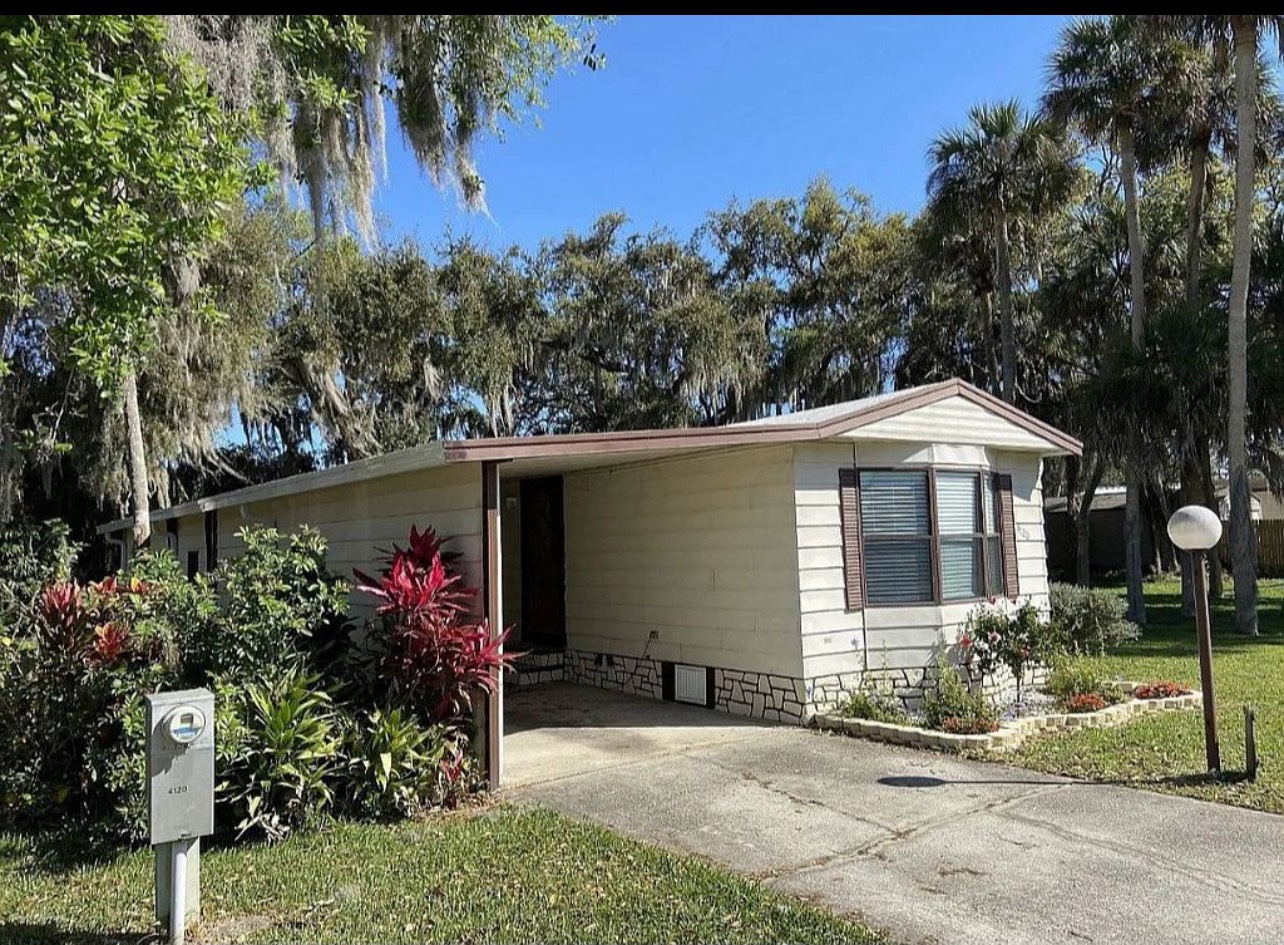 Attractive 1 Bedroom 1 Bathroom Home for sale in Cedar Lakes Mobile Home Park with option to purchase the land!! Bonus Room (10x20) Can easily be converted into a spare bedroom or office.  Located in an all-age community with an affordable lot rent of only 528.00 a month which includes cable, internet and lawn. Community Features: Clubhouse, pool, fishing lake, shuffleboard, clubhouse which can be used for small fee for private functions for members, and $200-year locked parking for boats and RVs if the need is there. Laminate flooring and ceiling fans throughout the home. The Kitchen is spacious and offers plenty of storage space with a pantry. The Bathroom has tile flooring and a garden tub. The Bedroom has a Serene Nature view from the bedroom window. There are washer and dryer hookups in the utility room along with more extra space for storage.