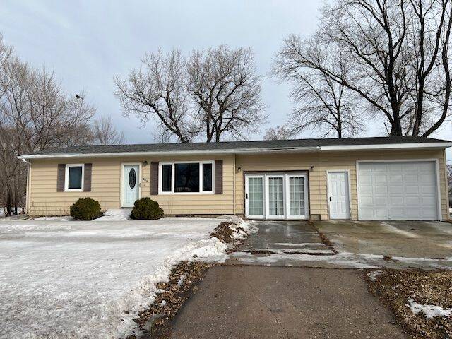 Slightly Used Never Abused. This 2 bedroom, 1 bath home is looking for a new owner. Attached den & one stall garage plus newer detached garage. New hot water heater, newer windows, metal & vinyl siding. Check it out!