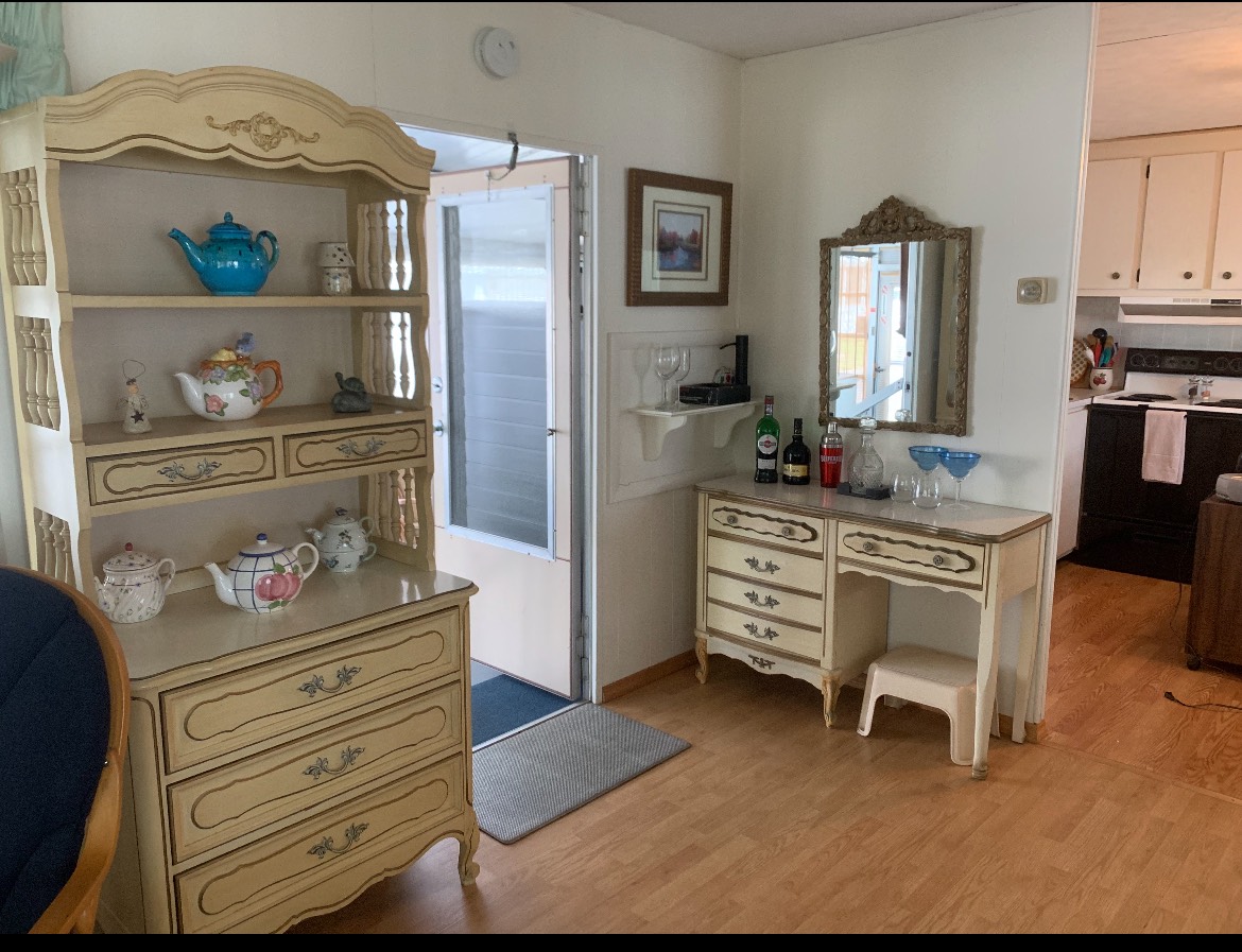 This cozy single wide with an attachment added, is ready for you. A large 2 bedroom,1& half baths fully furnished, in the heart of Vero Beach, has your name on it. This home has a large Florida room for you to entertain family and friends. Open floor with two oversized large bedrooms. This home offers New A/C, and a total remodel call today to schedule a showing.