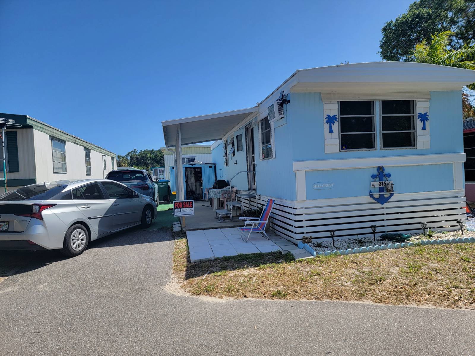 Ready to Move In 1-Bedroom Near Banana River only 4th home from the river- A Must See!    This cozy 1-bedroom, 1-bathroom home comes fully furnished. The lot rent is $745 per month, and it covers electric, water, and sewer. Just a short walk to the Banana River, it's a fisherman's paradise with two wooden fishing piers, great for picnics and enjoying sunrise walks.    Cape Canaveral is an excellent place to live or visit, especially if you're looking to escape colder climates. There's plenty to do here-cruises are just minutes away, and you can enjoy the beach, watch space shuttle launches, and explore city activities. The area is filled with restaurants, doctors, and shopping options.    The home is move-in ready and equipped with essentials, including linens and towels, so you only need to bring your toothbrush. Furnishings include a couch, recliner, bed, and wooden kitchen table. The electrical system is upgraded, there's a new wall unit in the living room (installed in 2024), and the roof was redone within the last five years. A new refrigerator is also part of the package.    Outside, a shed is available for storing fishing gear and tools, which you can use. A newer barbecue grill is neatly covered and ready for you. This well-cared-for home is just waiting for its next resident. Don't wait-call today for a private viewing!