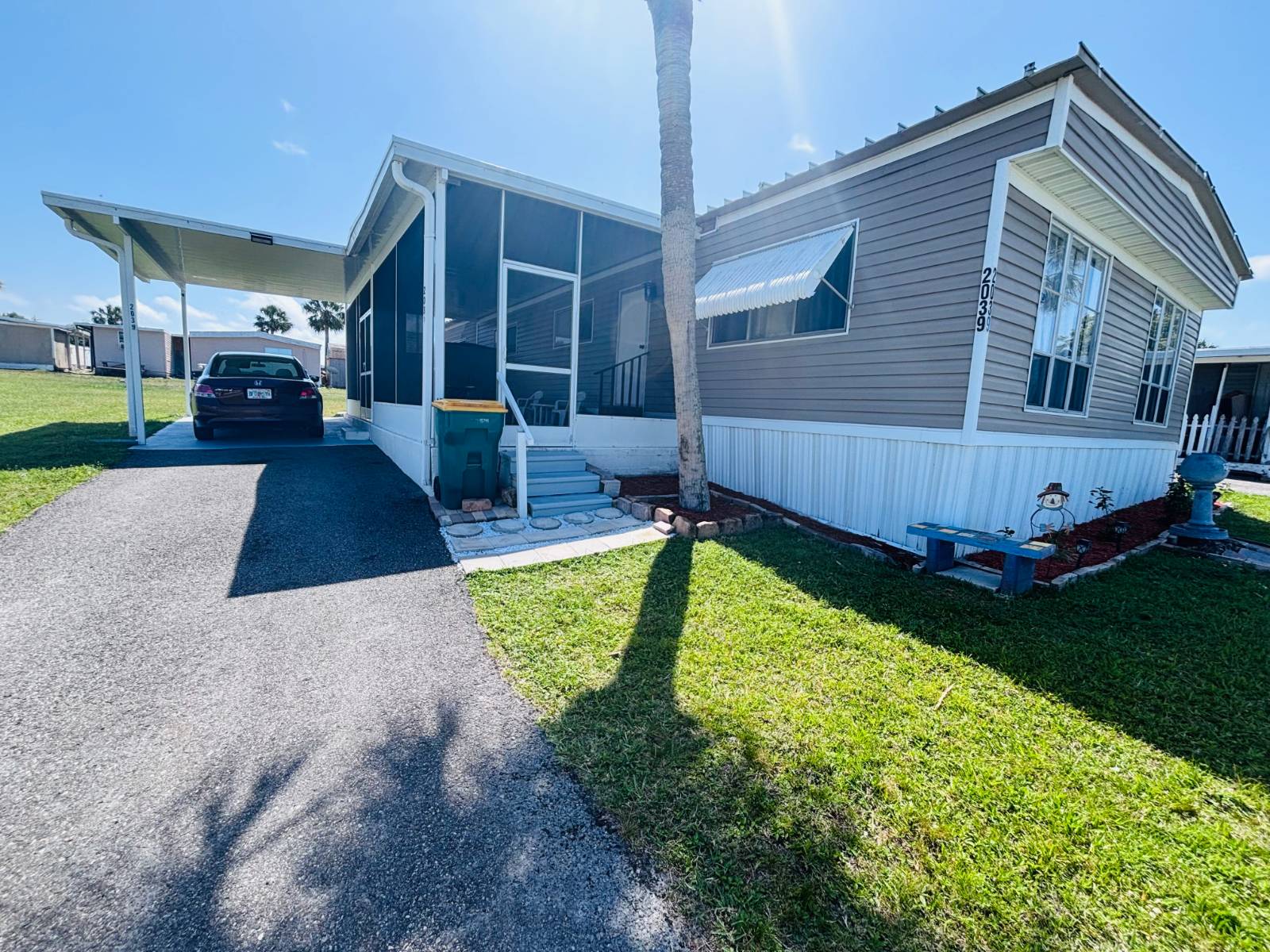 Your Dream Home Awaits! Stunning 4-Bedroom Retreat in a Vibrant, Pet-Friendly All-Ages Community!  Step into pure bliss with this gorgeously updated 4-bedroom mobile home nestled in the heart of a welcoming, all-ages park where community thrives and pets are family! This isn't just a home-it's a lifestyle upgrade, complete with a massive screened-in patio that's your ticket to bug-free outdoor living, perfect for sipping morning coffee, hosting epic BBQs, or unwinding under the stars.   Inside, you'll find no carpet anywhere-just sleek, durable vinyl flooring that's a breeze to clean and ideal for pet owners or allergy sufferers. The modern metal roof promises worry-free living for years, while the open-concept kitchen dazzles with ample space for culinary creations and lively gatherings. Need convenience? In-home washer and dryer hookups have you covered. Plus, the versatile dining area can transform into a chic home office, playful kid's zone, or even a fifth bedroom-whatever your heart desires!  Living here means embracing the perks of an all-ages, pet-friendly park where neighbors become friends and furry companions roam happily. With low lot rent that includes lawn care, you'll save time and money to focus on what matters most. Nestled in a safe, low-crime area, this community offers peace of mind and a secure haven for all.   Best of all? Seller financing may be available, making your dream home more attainable than ever! Don't wait-this low-maintenance, high-charm gem won't last long. Schedule your private tour today and start living the life you've always imagined!