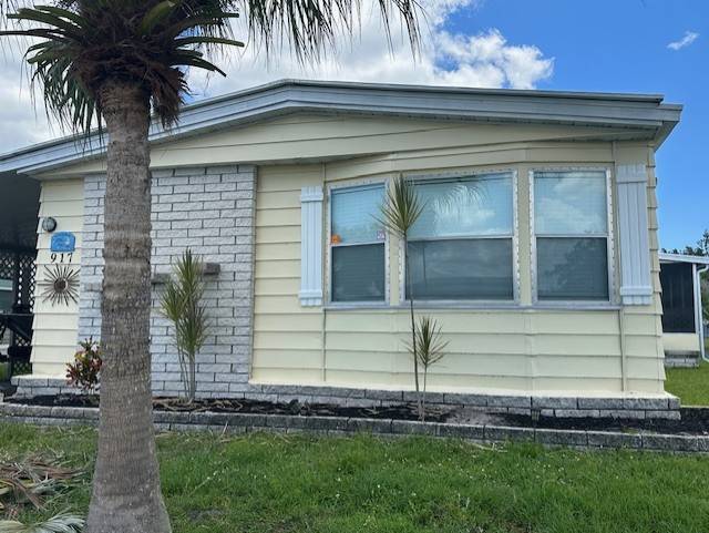 This 1,152 SF home is awaiting your arrival.  Laminate flooring with plywood subflooring throughout.  A/C and tankless hot water heater one year old.  Roof was resealed in 2024.  Furnished and move in ready, a perfect winter retreat or forever home.  Do not miss your opportunity to enjoy paradise 365 days a year in the highly sought after age qualified community of Village Green in Vero Beach FL.