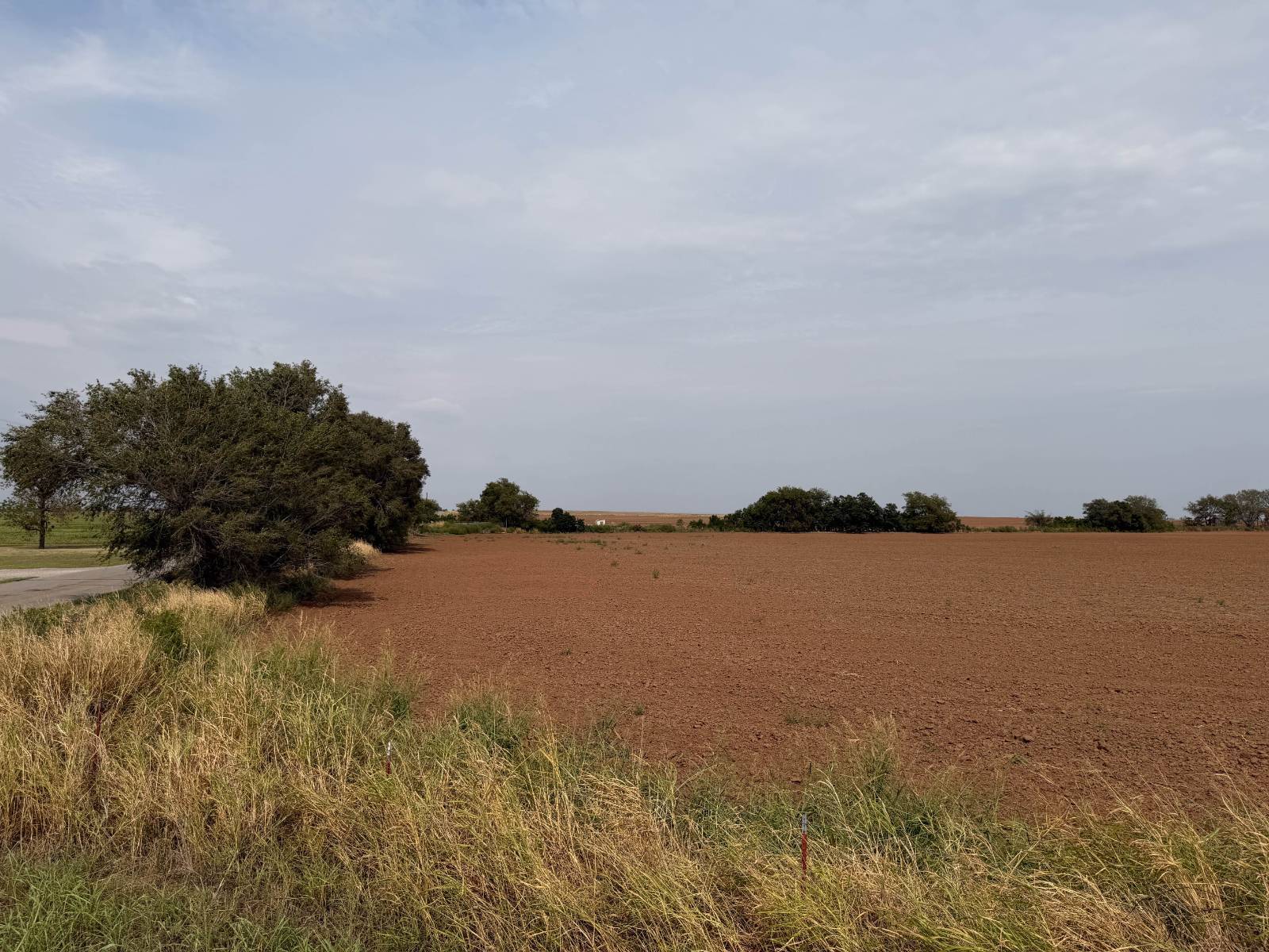 Photo 1 of 7 of land for sale at W Longhorn Trail & S Oakwood Rd, Waukomis, OK 73773